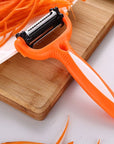 Kitchen peeler Multifunctional peeler Vegetable peeler Fruit peeler Julienne slicer Kitchen utensil Culinary tool Cooking accessory Kitchen gadget Peel, slice, julienne