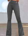 Tummy control flared pants High-waisted flared trousers Slimming flare leg pants Flare yoga pants with control panel Figure-flattering bell bottom pants Waist-shaping flared trousers Stretchy flare leg pants with tummy control Flare pants for women Bootcut pants with slimming effect Flare leggings with shaping waistband