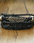 4Pcs/Set braided leather bracelets with wooden beads and rustic charms, including life tree and rudder designs, offering a vintage tribal-inspired look with braided patterns and durable leather for a stylish, ethnic accessory.