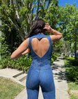 Heart cutout jumpsuit Backless jumpsuit Romantic jumpsuit Figure-flattering jumpsuit Special occasion attire Elegant jumpsuit Eye-catching outfit Fashion-forward jumpsuit Playful back detail Head-turning style