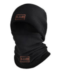The versatile Face Mask Neck Warmer Beanie displayed alongside snowboarding essentials, highlighting its use for outdoor winter fashion and tactical winter gear.