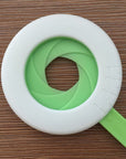 Close-up of a durable plastic spaghetti portion tool used for accurately measuring pasta portions, featuring a compact and easy-to-use design. Ideal as a pasta measuring tool, spaghetti measuring tool, spaghetti measurer, and versatile pasta measurer tool for home kitchens.