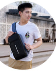 Anti-theft crossbody sling bag made from durable polyester, featuring a USB charging port, computer pocket, and soft surface. Ideal for secure storage and on-the-go charging, with a stylish, casual design and car suture detail.