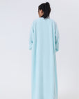 Cozy 3-piece pajama set for women, featuring a soft crop top, wide-leg pants, and a matching knee-length pullover in pastel colors.