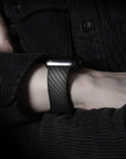 A lightweight and durable carbon fiber watch band that combines fashion and functionality, providing a secure fit for your Apple Watch.