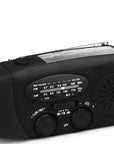 Solar hand crank radio with USB charging port, red in color. Features include a Midland Weather Alert Radio, hand crank radio flashlight, and solar charging capabilities, designed for emergency preparedness and outdoor use.