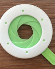 Close-up of a durable plastic spaghetti portion tool used for accurately measuring pasta portions, featuring a compact and easy-to-use design. Ideal as a pasta measuring tool, spaghetti measuring tool, spaghetti measurer, and versatile pasta measurer tool for home kitchens.