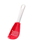 Close-up of a multifunctional slotted spoon grinding cooking spoon, showcasing its innovative design for mashing garlic, ginger, and potatoes, doubling as a stir-frying spatula and versatile kitchen gadget.