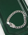 Elegant sterling silver belt bracelet with geometric design and platinum plating, featuring a unique belt buckle style.