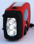 Solar hand crank radio with USB charging port, red in color. Features include a Midland Weather Alert Radio, hand crank radio flashlight, and solar charging capabilities, designed for emergency preparedness and outdoor use.