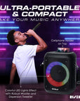 Portable karaoke machine with 2 wireless mics, Bluetooth, and 15-watt speaker. Includes multiple playback modes, smart device holder, and rechargeable battery.