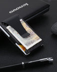 Lightweight and durable wallet made from premium carbon fiber, ideal for travel and business use, featuring stylish aesthetics and compact storage
