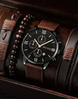 A close-up shot of a men's luxury business watch featuring a leather strap and sapphire crystal lens.
