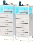 Modern nightstand with built-in charging station, LED light, and three fabric drawers. Includes USB ports and outlets for easy device charging, perfect for bedroom or bedside use