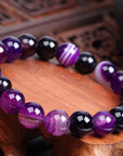 Elegant real amethyst bracelet featuring purple stone beads, perfect for adding a touch of sophistication to any outfit