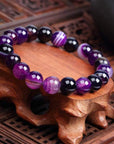 Elegant real amethyst bracelet featuring purple stone beads, perfect for adding a touch of sophistication to any outfit