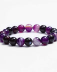Elegant real amethyst bracelet featuring purple stone beads, perfect for adding a touch of sophistication to any outfit.