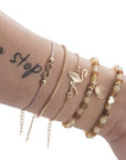 Elegant anklet bracelet featuring a star and moon design, with geometric, love, and flower elements. Includes turtle charm and beaded accents for a unique, boho-inspired look perfect for special occasions like weddings, anniversaries, and birthdays