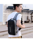 Anti-theft crossbody sling bag made from durable polyester, featuring a USB charging port, computer pocket, and soft surface. Ideal for secure storage and on-the-go charging, with a stylish, casual design and car suture detail.