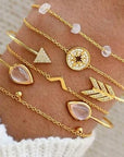 Elegant anklet bracelet featuring a star and moon design, with geometric, love, and flower elements. Includes turtle charm and beaded accents for a unique, boho-inspired look perfect for special occasions like weddings, anniversaries, and birthdays