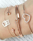 Elegant anklet bracelet featuring a star and moon design, with geometric, love, and flower elements. Includes turtle charm and beaded accents for a unique, boho-inspired look perfect for special occasions like weddings, anniversaries, and birthdays