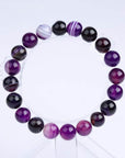 Elegant real amethyst bracelet featuring purple stone beads, perfect for adding a touch of sophistication to any outfit