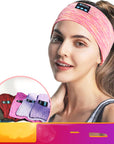 A pink Bluetooth music headband designed as a wireless eye mask, featuring hands-free calling, voice control, and stereo sound. Ideal for running, relaxing, or sleeping, offering a comfortable, head-mounted fit with Bluetooth 5.0 connectivity.
