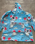 Snuggly wearable blanket hoodie providing unmatched comfort and warmth for all-day wear.