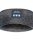 A pink Bluetooth music headband designed as a wireless eye mask, featuring hands-free calling, voice control, and stereo sound. Ideal for running, relaxing, or sleeping, offering a comfortable, head-mounted fit with Bluetooth 5.0 connectivity.