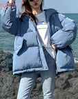 Warm parka coat Cozy winter parka Insulated parka jacket Quilted parka for cold weather Padded winter coat for warmth Faux fur-lined parka Hooded parka for chilly days Long down parka for cold climates Waterproof winter parka Stylish insulated outerwear