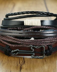 4Pcs/Set braided leather bracelets with wooden beads and rustic charms, including life tree and rudder designs, offering a vintage tribal-inspired look with braided patterns and durable leather for a stylish, ethnic accessory.