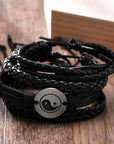 4Pcs/Set braided leather bracelets with wooden beads and rustic charms, including life tree and rudder designs, offering a vintage tribal-inspired look with braided patterns and durable leather for a stylish, ethnic accessory.