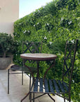 White oasis artificial vertical garden Faux vertical garden with white oasis design Artificial oasis wall panel with white foliage Decorative vertical garden featuring white oasis accents Synthetic oasis wall with lifelike white plants White oasis artificial green wall for indoor and outdoor decor Oasis-inspired artificial greenery wall with white elements Faux vertical garden panel adorned with white oasis motifs White oasis artificial plant wall for home and event decor