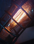 Vintage steampunk rocket lamp with intricate detailing and a glowing flame night light. This unique rocket ship lamp adds retro-futuristic charm to any room, perfect for use as a steampunk desk lamp, or stylish lighting for your bar, store, or office. Featuring high-quality craftsmanship and an E26 bulb for bright illumination, this steampunk lighting fixture enhances any space with its vintage appeal.