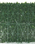 White flowering artificial boxwood wall Artificial boxwood wall with white flowers Faux boxwood wall panel with flowering white blooms Decorative boxwood backdrop with white floral accents Artificial hedge wall featuring white flowering foliage White flower boxwood wall panel for indoor and outdoor decor Lifelike artificial boxwood wall with white blossoms Faux boxwood paneling adorned with white flowers White floral artificial greenery wall for home and event decor