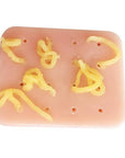 A realistic pimple popping squishy toy made from non-toxic TPE material, featuring 11 holes for stress relief.