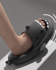 A close-up image of cute shark-themed footwear with anti-skid soles, showcasing their playful design and high-quality materials.