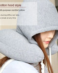 Soft and supportive neck pillow with a hood, ideal for planes, trains, and car rides.