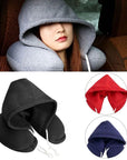 Stylish hooded neck pillow providing ergonomic support and plush comfort for travel.