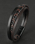 A sleek unisex leather bracelet styled with casual wear, highlighting its eco-friendly cattle leather and timeless appeal.