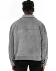 Boxy suede jacket Luxurious suede outerwear Contemporary jacket silhouette Minimalist suede coat Soft suede fabric Stylish outerwear piece Chic suede jacket design Versatile jacket for any occasion Fashionable suede outer layer Sophisticated suede coat A versatile oversized suede jacket with a classic boxy fit, designed for both men and women, offering a stylish and timeless look