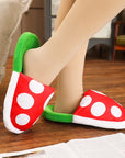 Plush slippers showcasing the Mario Flower from Super Mario, perfect for Mario Bros fans and collectors.