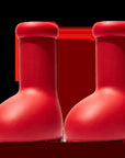 Big red boots Bold fashion footwear Statement boots Vibrant red shoes Stylish red footwear Eye-catching boots Fashionable statement shoes Bold footwear choice Red boots for standout style Trendy red boots