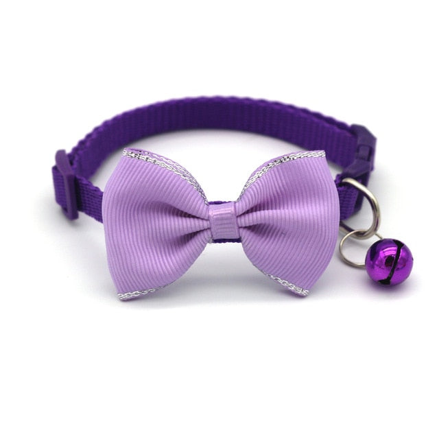 Bow and bell pet collar Fashionable pet accessory Stylish pet collar with bow Cute pet collar with bell Adorable pet collar design High-quality pet collar Durable pet collar for daily wear Pet fashion accessory Pet collar with charm Pet collar with bow and bell