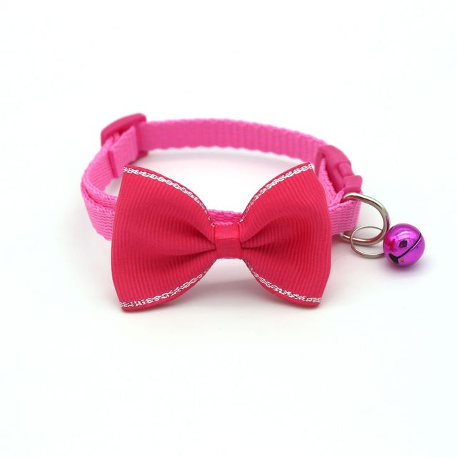 Bow and bell pet collar Fashionable pet accessory Stylish pet collar with bow Cute pet collar with bell Adorable pet collar design High-quality pet collar Durable pet collar for daily wear Pet fashion accessory Pet collar with charm Pet collar with bow and bell