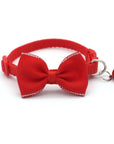 Bow and bell pet collar Fashionable pet accessory Stylish pet collar with bow Cute pet collar with bell Adorable pet collar design High-quality pet collar Durable pet collar for daily wear Pet fashion accessory Pet collar with charm Pet collar with bow and bell