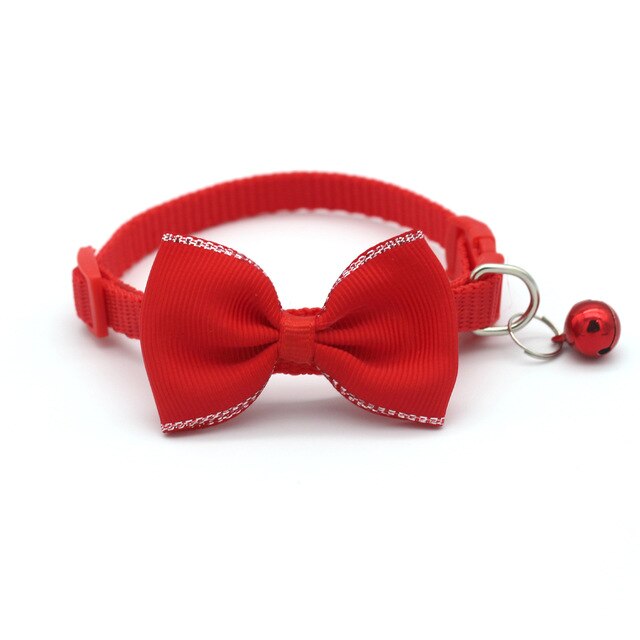 Bow and bell pet collar Fashionable pet accessory Stylish pet collar with bow Cute pet collar with bell Adorable pet collar design High-quality pet collar Durable pet collar for daily wear Pet fashion accessory Pet collar with charm Pet collar with bow and bell