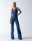 Heart cutout jumpsuit Backless jumpsuit Romantic jumpsuit Figure-flattering jumpsuit Special occasion attire Elegant jumpsuit Eye-catching outfit Fashion-forward jumpsuit Playful back detail Head-turning style