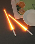 LED chopsticks Lightsaber utensils Novelty dining Geeky gadgets Futuristic tableware Star Wars chopsticks Illuminated dining Sci-fi kitchenware Fun food accessories Glow-in-the-dark chopsticks