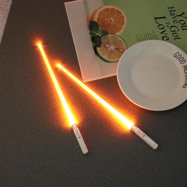 LED chopsticks Lightsaber utensils Novelty dining Geeky gadgets Futuristic tableware Star Wars chopsticks Illuminated dining Sci-fi kitchenware Fun food accessories Glow-in-the-dark chopsticks